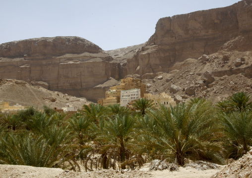 Traditional Buildings Overlooking The Palm Trees In Hadramaut, Yemen