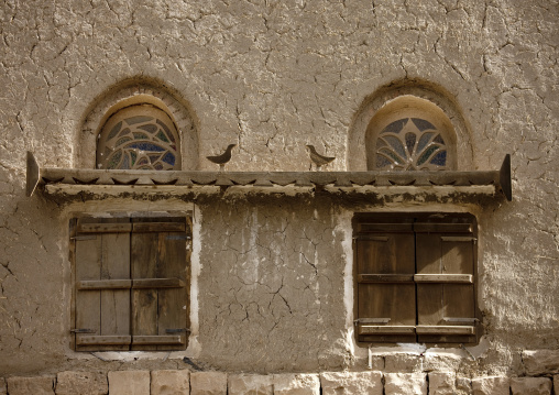 Stained Glass Windows And Wooden Birds Over Shutted Windows, Amran, Yemen