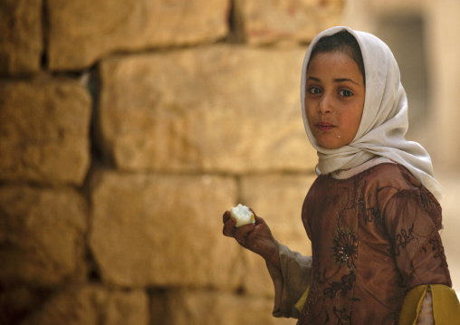 Young Yemeni Girl Eating A Boiled Egg, Amran, Yemen