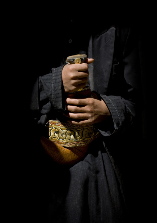 Close-up On The Hands Of A Man Holding His Jambiya, Thula, Yemen