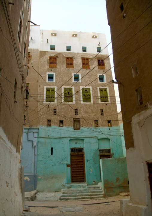 Turquoise Front Of A Five To Six Storey Building In The Old Town Of Shibam, Yemen