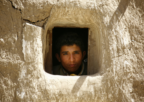 Young Boy Looking Out From A Small Window, Amran, Yemen