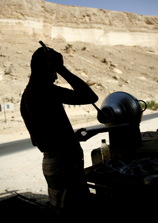 Man Preparing Foul Meal In A Restaurant Along The Road, Yemen