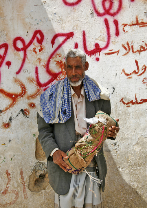 Qat Seller Holding A Bag Of Qat, Seiyun, Yemen