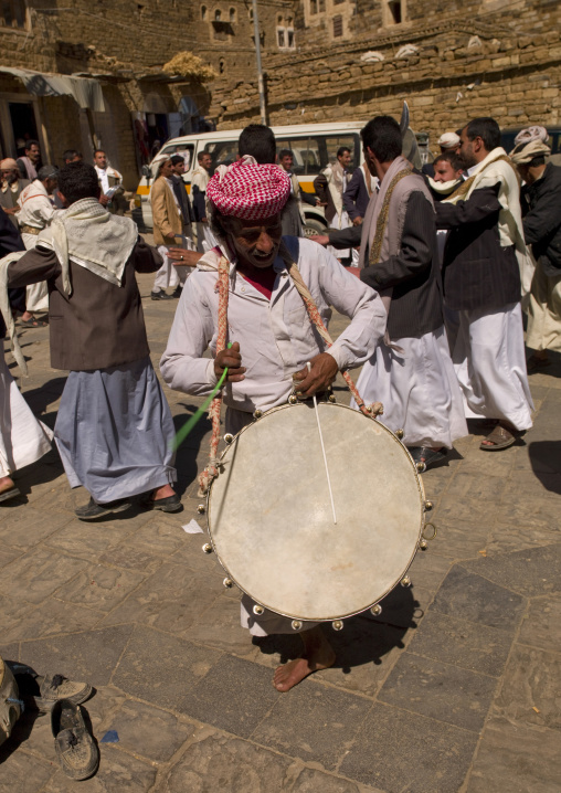 Man Playing Drum At A Wedding In Thula, Yemen