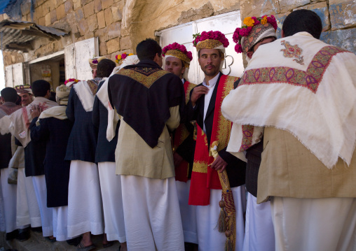 Grooms With Traditional Turbans Decorated With Flowers Standing In Line During A Wedding, Thula, Yemen
