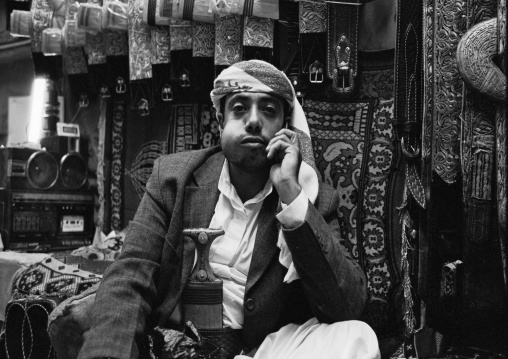 Man Chewing Qat While Waiting For A Phone Call In A Shop, Sanaa, Yemen