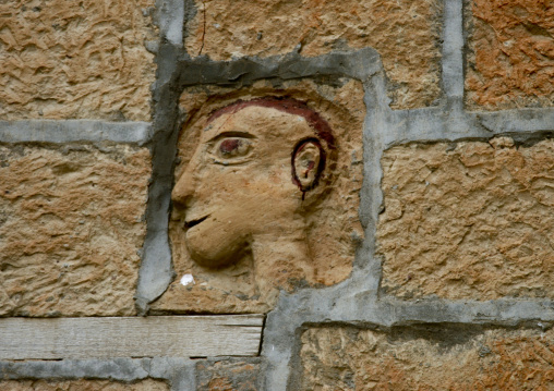 Profile Of A Face Carved On A Wall In Ibb, Yemen