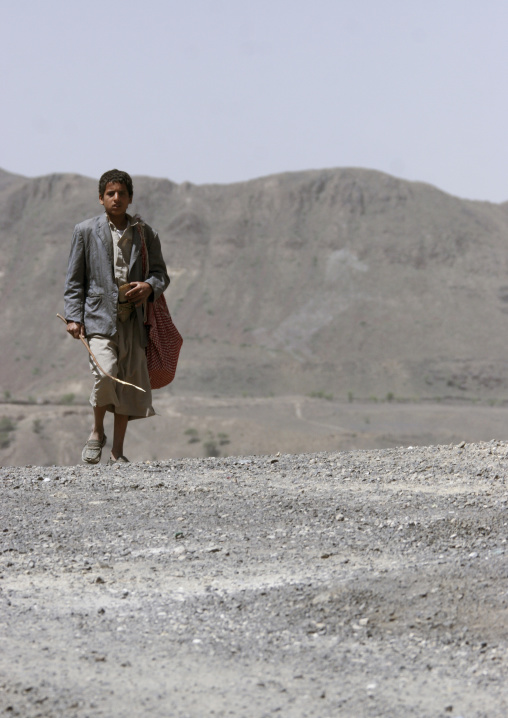 Boy Walking On The Desert, Yemen