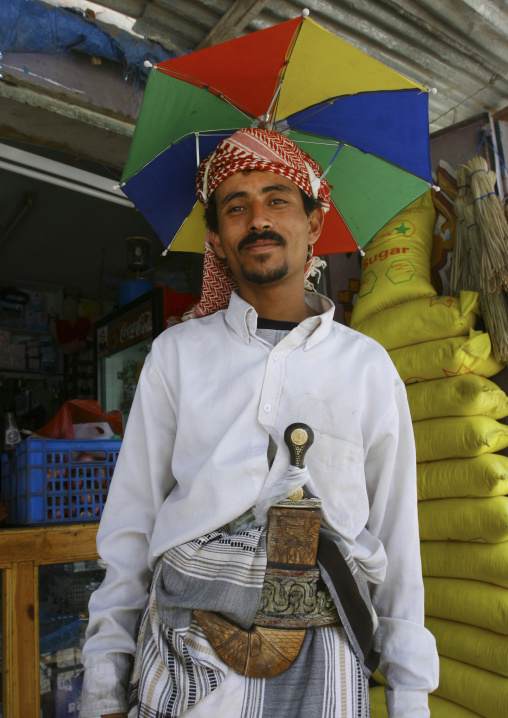 Man Wearing A Umbrella Over His Turban And Carrying A Dagger, Rada, Yemen