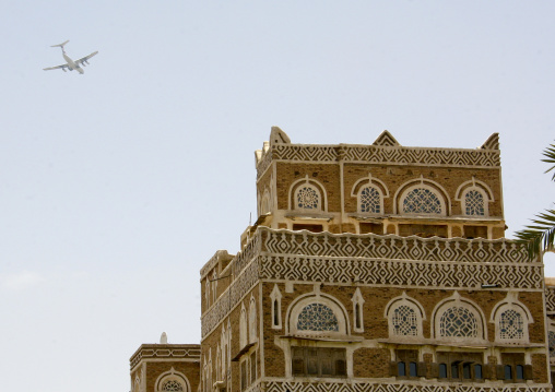 Plane Passing Over A House In Sanaa, Yemen