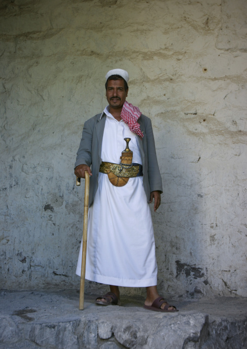 Man Wearing A Dagger Or Jambia And Standing Proud With  A Cane, Yafrus, Yemen