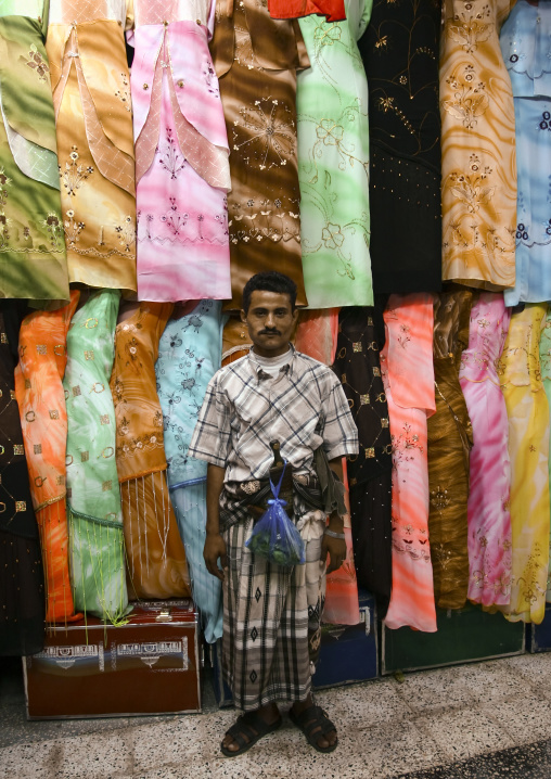 Man Standing In Front Of A Clothes Shop In Al Hodeidah Souq, Yemen