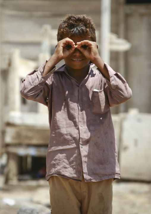 Boy Mimicing Binoculars With His Hands, Mocha, Yemen