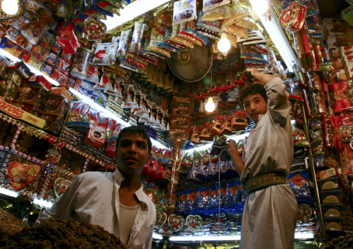 Two Candy Sellers Standing In Their Shop, Old Souq Of Sanaa, Yemen