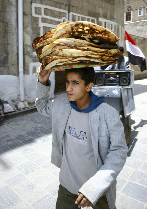 Boy Holding A Plate Of Bread, Sanaa, Yemen