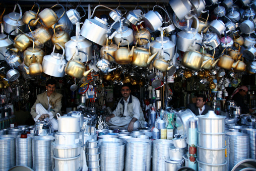 Shop Keepers Selling Coffee Pot, Huge Kettles And Other Crockery, Sanaa' Souq, Yemen