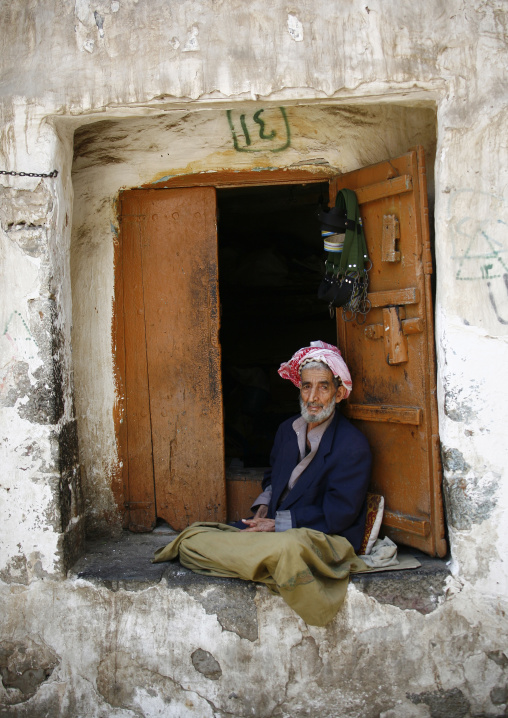 Smiling Old Yemeni Man Selling Khat Sitting Outside His Shop, Sanaa, Yemen