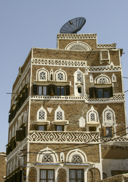 Traditional house in the old city featuring stained-glass windows, Amanat Al-Asemah, Sanaa, Yemen