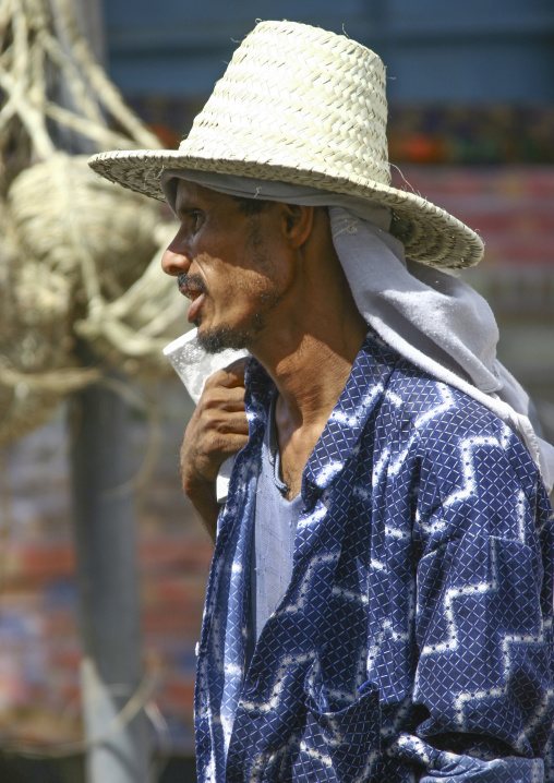 Portrait of a yemeni man with a straw hat, Taiz Governorate, Mokha, Yemen