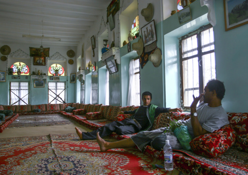 Yemeni men chewing qat in a mafraj, Haraz Mountains, Al Hajjarah, Yemen