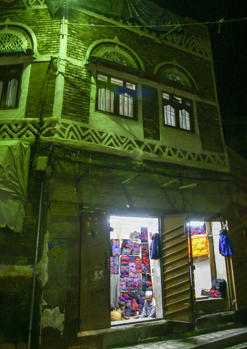Fabrics shop at night, Amanat Al-Asemah, Sanaa, Yemen