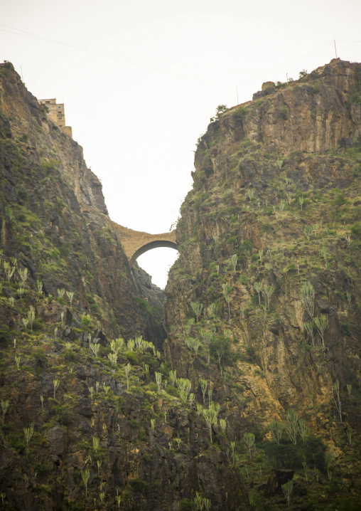 The Shahara bridge over a rocky gorge, Amran Governorate, Shaharah, Yemen