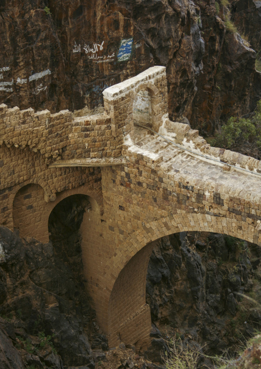 The Shahara bridge over a rocky gorge, Amran Governorate, Shaharah, Yemen