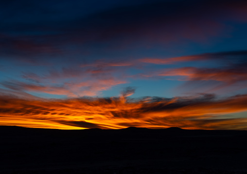 Sunset over the sand dunes in the desert, Tassili N'Ajjer National Park, Tadrart Rouge, Algeria