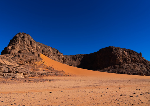 Rocks and sand dunes in Sahara desert, Tassili N'Ajjer National Park, Tadrart Rouge, Algeria