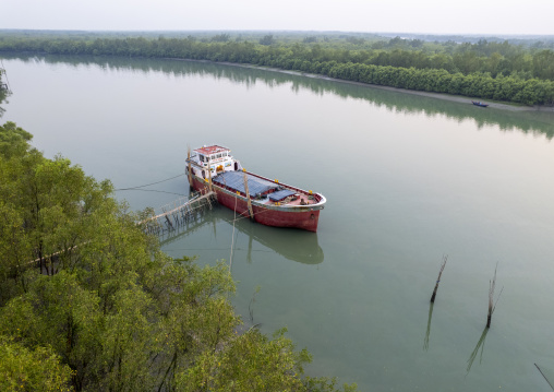 Aerial view of a boat near the mangrove in the Sundarbans, Khulna Division, Shyamnagar, Bangladesh