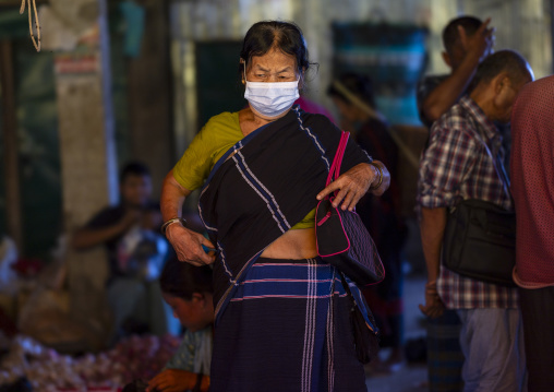 Chakma tribe woman wearing a covid mask, Chittagong Division, Rangamati Sadar, Bangladesh