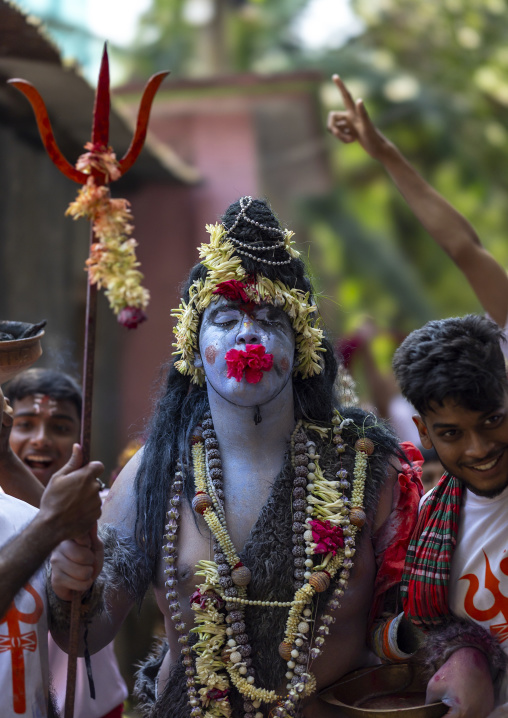 Lord Shiva procession with devotees at Lal Kach festival, Dhaka Division, Tongibari, Bangladesh