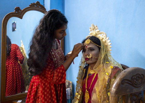 Make up of Parvati wife of Lord Shiva played by a man during Lal Kash festival, Dhaka Division, Munshiganj, Bangladesh