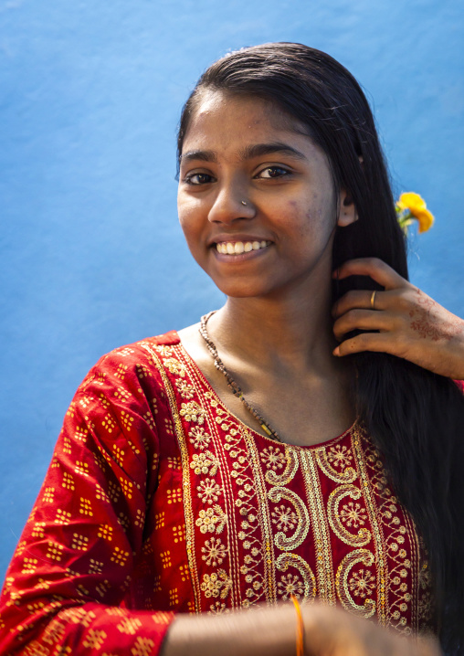 Portrait of a smiling bangladeshi hindu teenage girl with long black hair, Dhaka Division, Munshiganj, Bangladesh