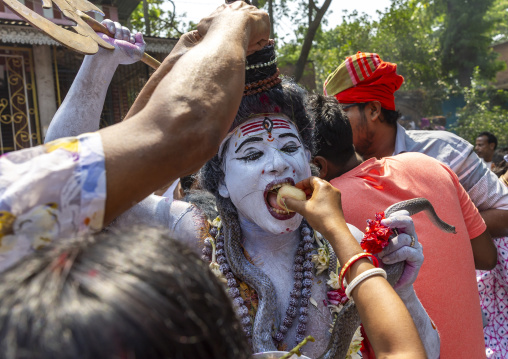 Lord Shiva procession with devotees at Lal Kach festival, Dhaka Division, Munshiganj, Bangladesh