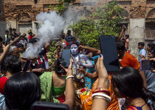 Lord Shiva procession with devotees at Lal Kach festival, Dhaka Division, Munshiganj, Bangladesh