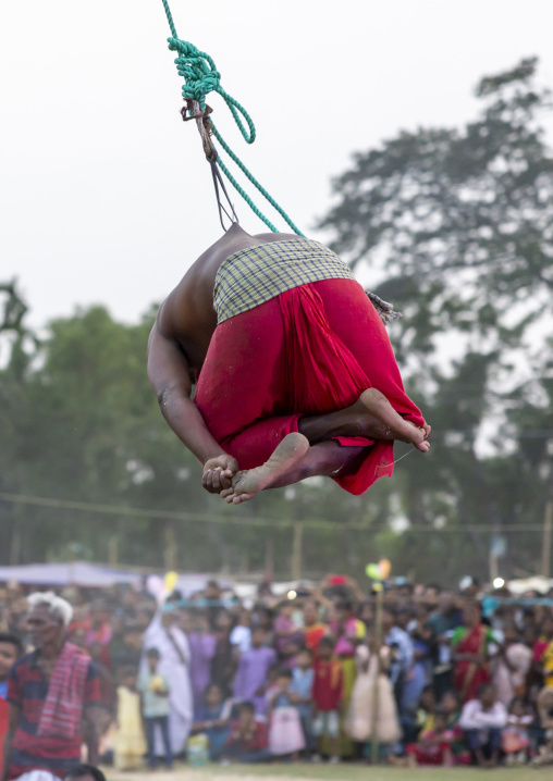 Body suspension with hooks during Charak Puja hindu festival, Sylhet Division, Kamalganj, Bangladesh