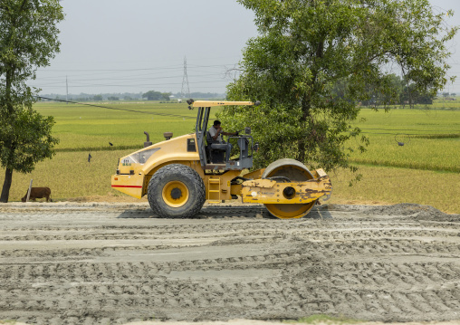Bulldozer working on a new highway, Sylhet Division, Kamalganj, Bangladesh