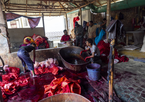 Bangladeshi men working in a batik factory, Chittagong Division, Comilla, Bangladesh