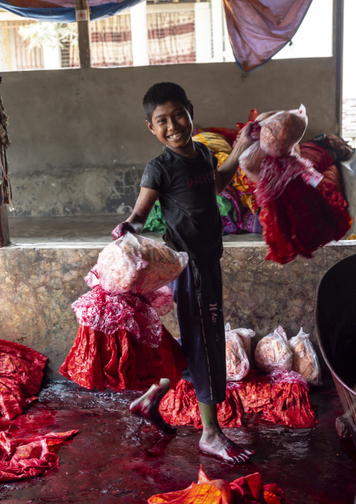 Bangladeshi boy working in a batik factory, Chittagong Division, Comilla, Bangladesh