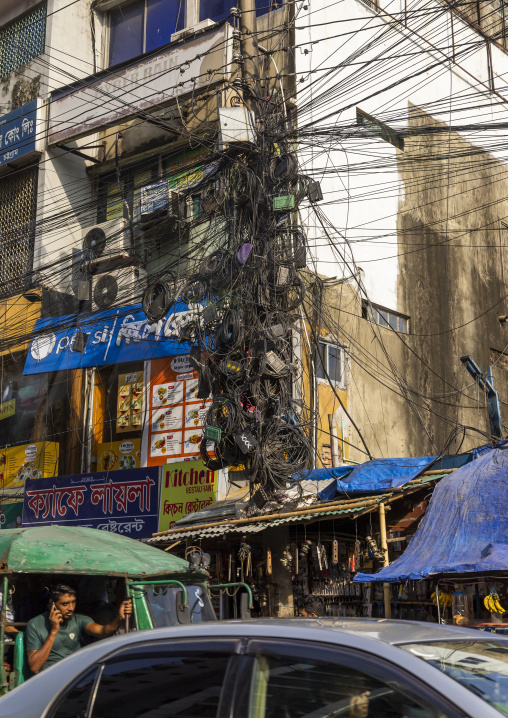 Tangled wires hanging on electricity pole, Chittagong Division, Chittagong, Bangladesh