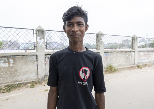 Bangladeshi teenage boy with a t-shirt with the No Girl logo, Dhaka Division, Dhaka, Bangladesh