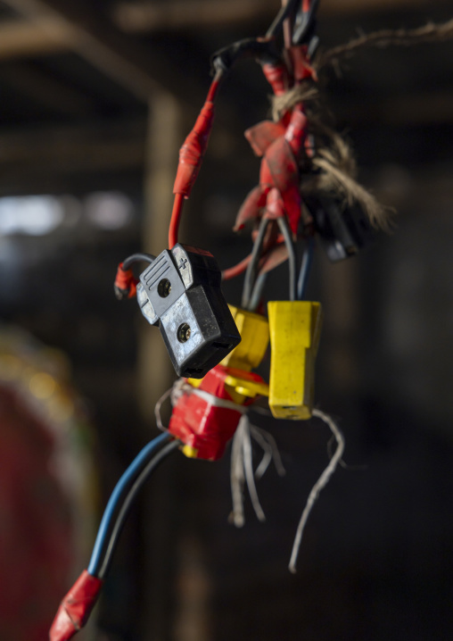 Electric rickshaw charging, Dhaka Division, Dhaka, Bangladesh
