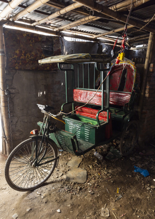 Electric rickshaw charging, Dhaka Division, Dhaka, Bangladesh