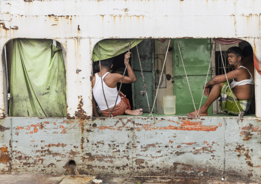 Men inside a ferry vessel, Dhaka Division, Dhaka, Bangladesh