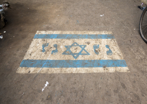 Israeli flag painted on the ground to be trampled by passersby, Dhaka Division, Keraniganj, Bangladesh