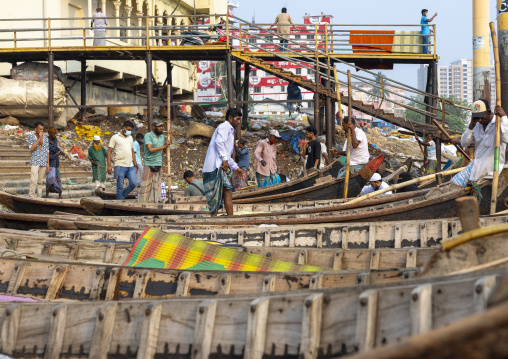 Bangladeshi people embarking on boats in Sadar Ghat, Dhaka Division, Keraniganj, Bangladesh