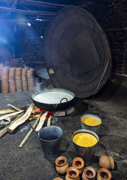 Clay pots around a bonfire to make traditional yogurt, Rajshahi Division, Bogura, Bangladesh