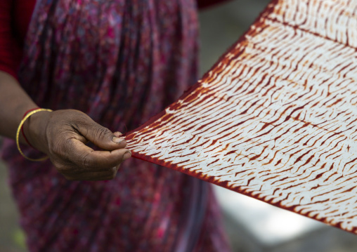 Shawl made with red tie-dye resist dyeing technique in Living Blue, Rangpur Division, Goalpara, Bangladesh